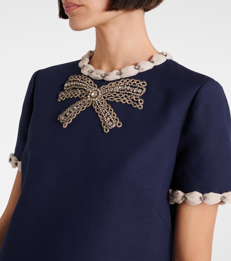 Navy dress with embellished bow neckline