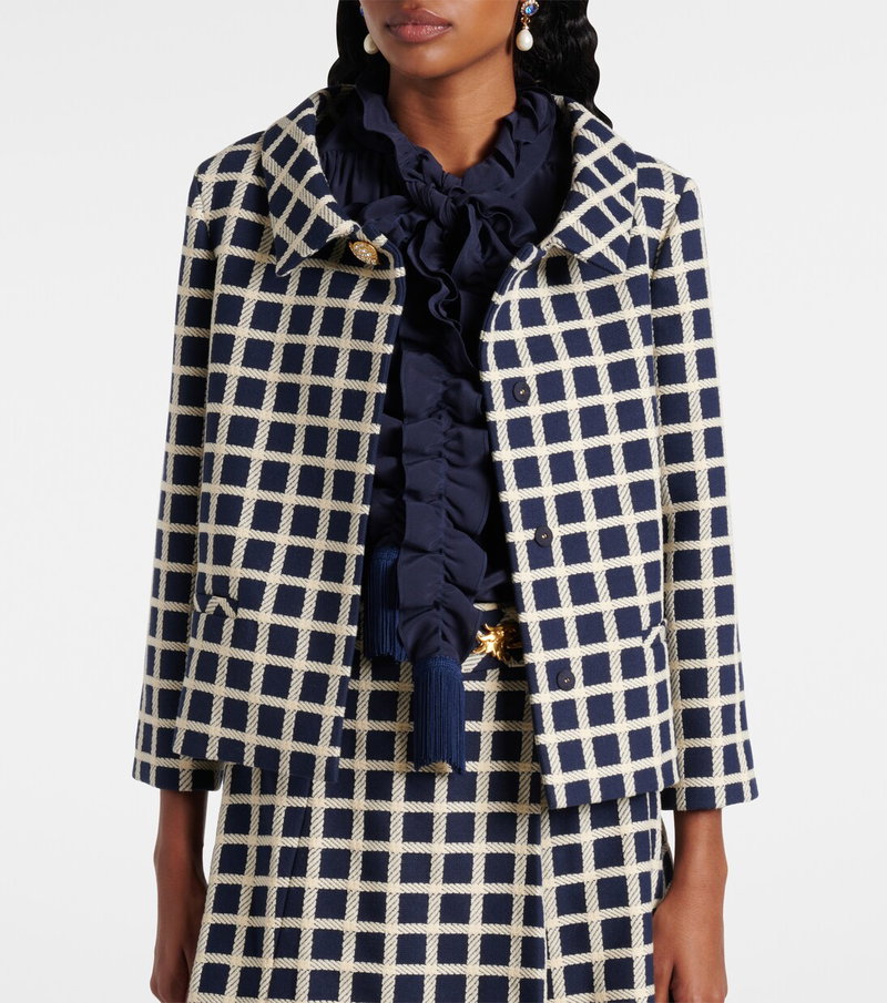 Valentino navy and cream checked tweed jacket with ruffled blouse.