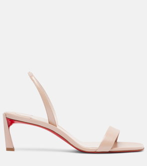 Pale pink leather heeled sandal with red sole.