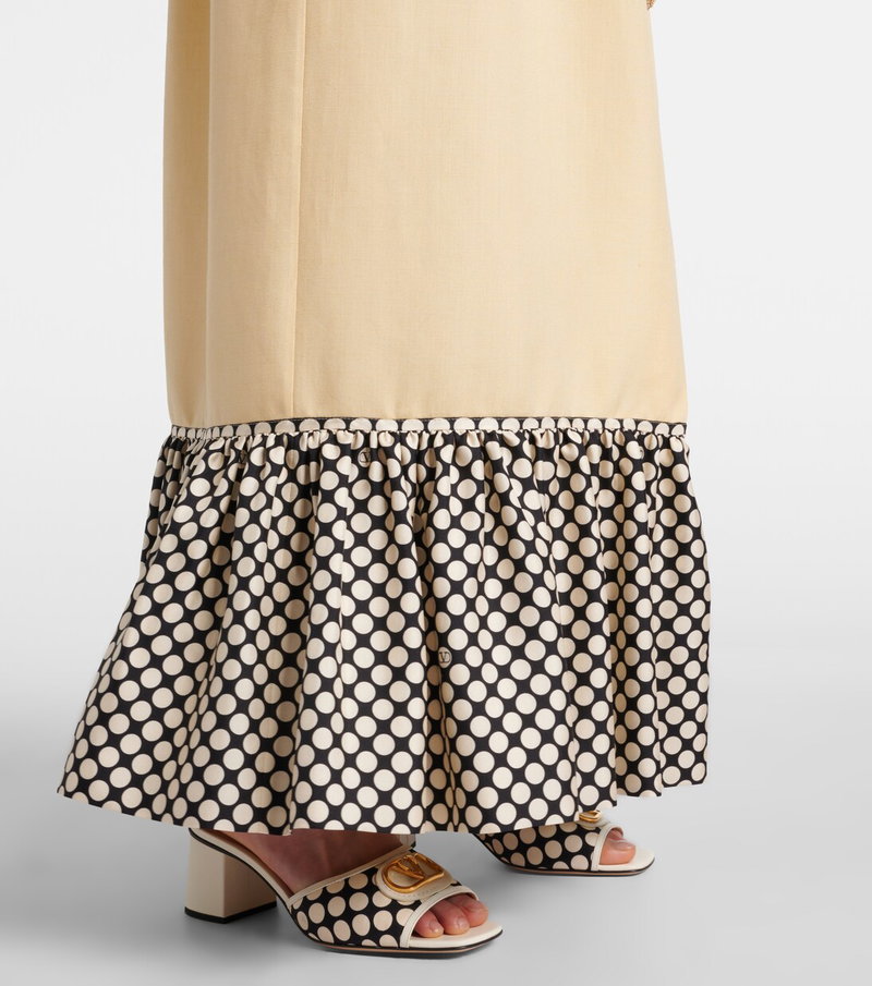 Valentino polka-dot maxi skirt with ruffled hem and matching sandals.