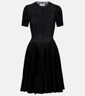 Black mesh dress with subtle sparkle and gathered skirt