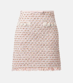 Pink and blue tweed mini skirt with pearl buttons