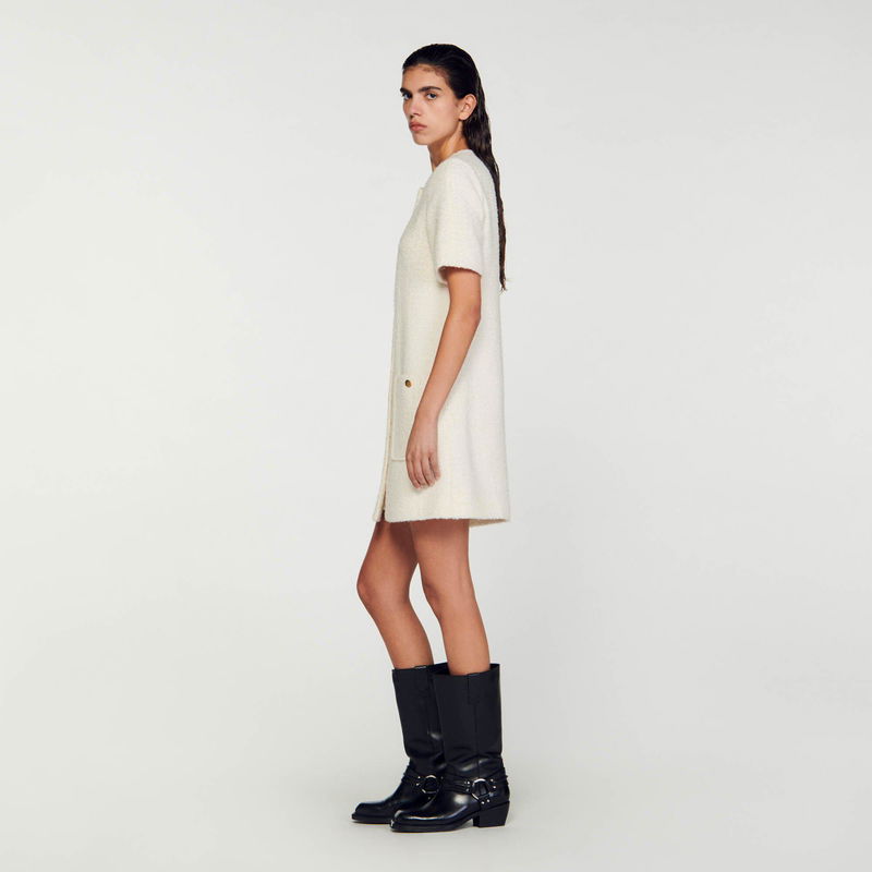 Cream-colored knit dress with boots