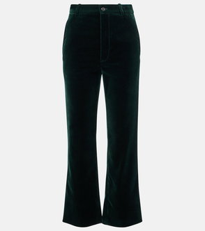 Dark green velvet trousers, angled view