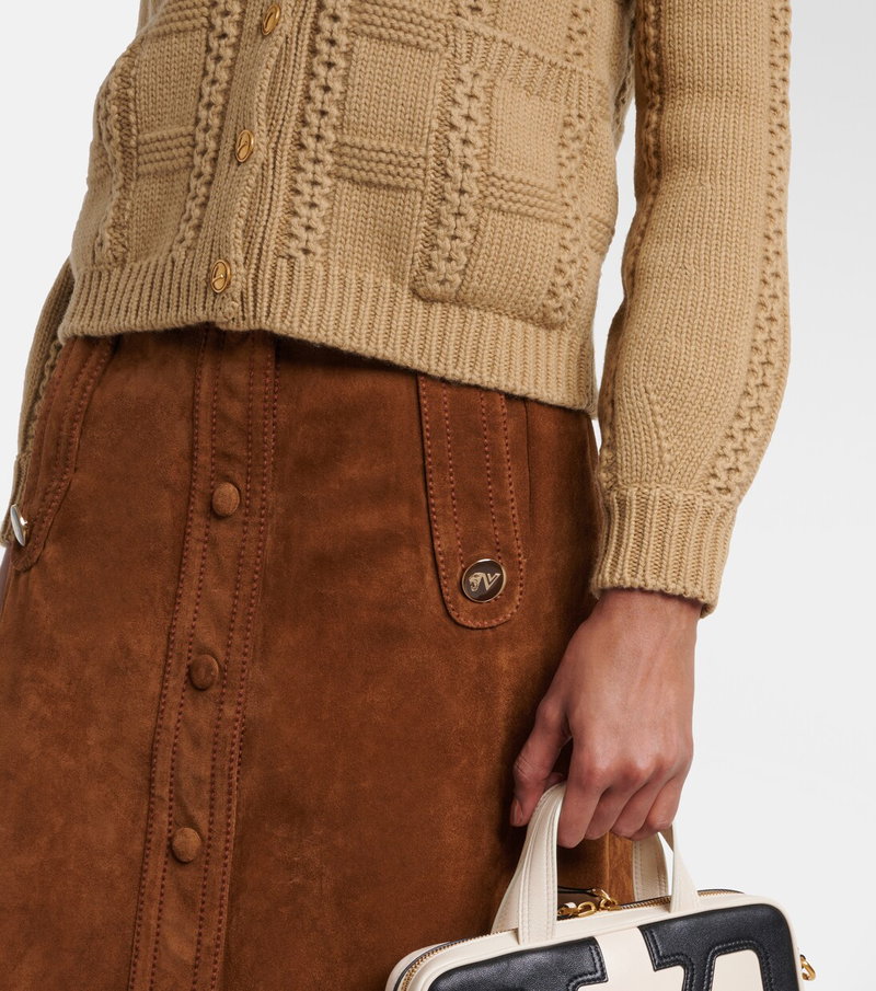 Valentino suede skirt with button detailing.