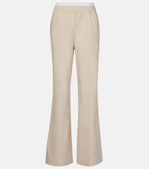 Beige wide-leg trousers with a drawstring waist.