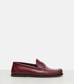 Burgundy leather loafers with gold buckle