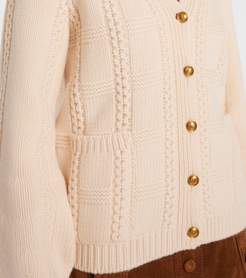 Cream cable-knit cardigan with gold buttons