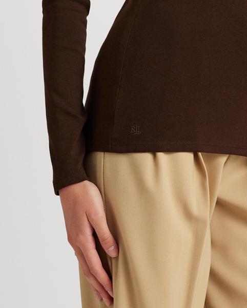 Brown long-sleeved top with Ralph Lauren logo, paired with beige trousers.