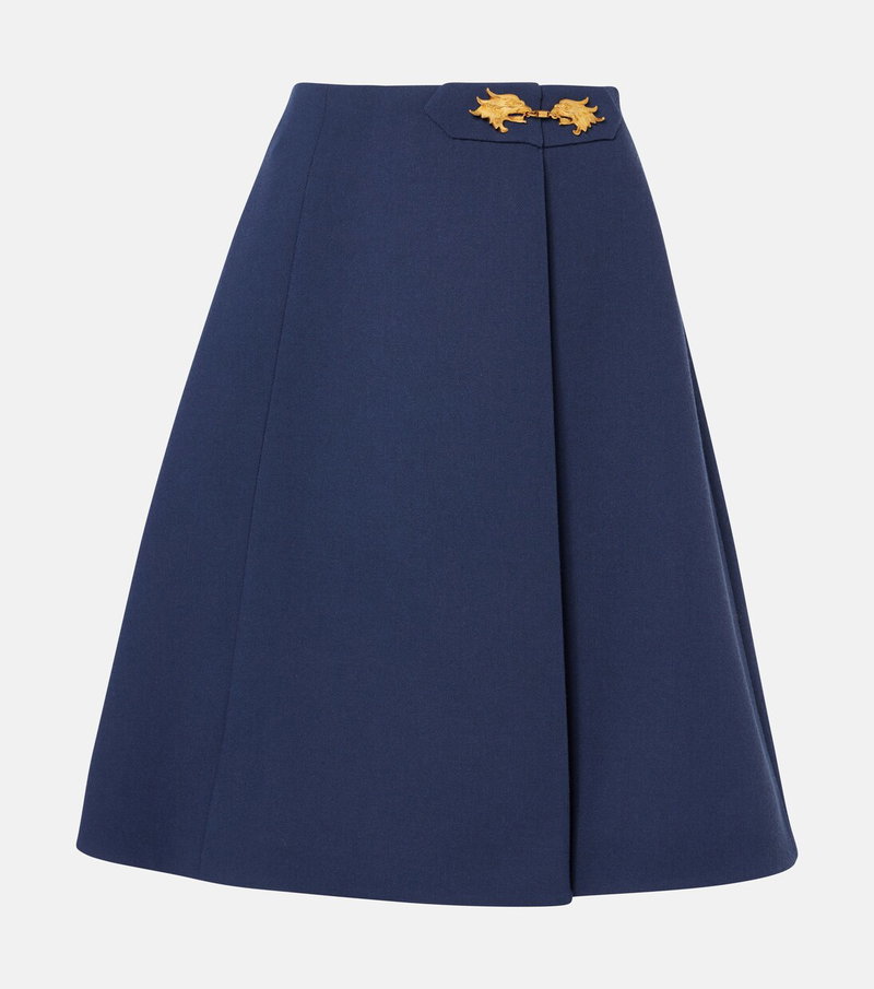 Navy pleated skirt with gold lion buckles