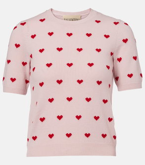 Pink sweater with red heart embroidery