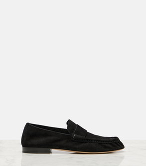 Black suede loafers with a grosgrain trim