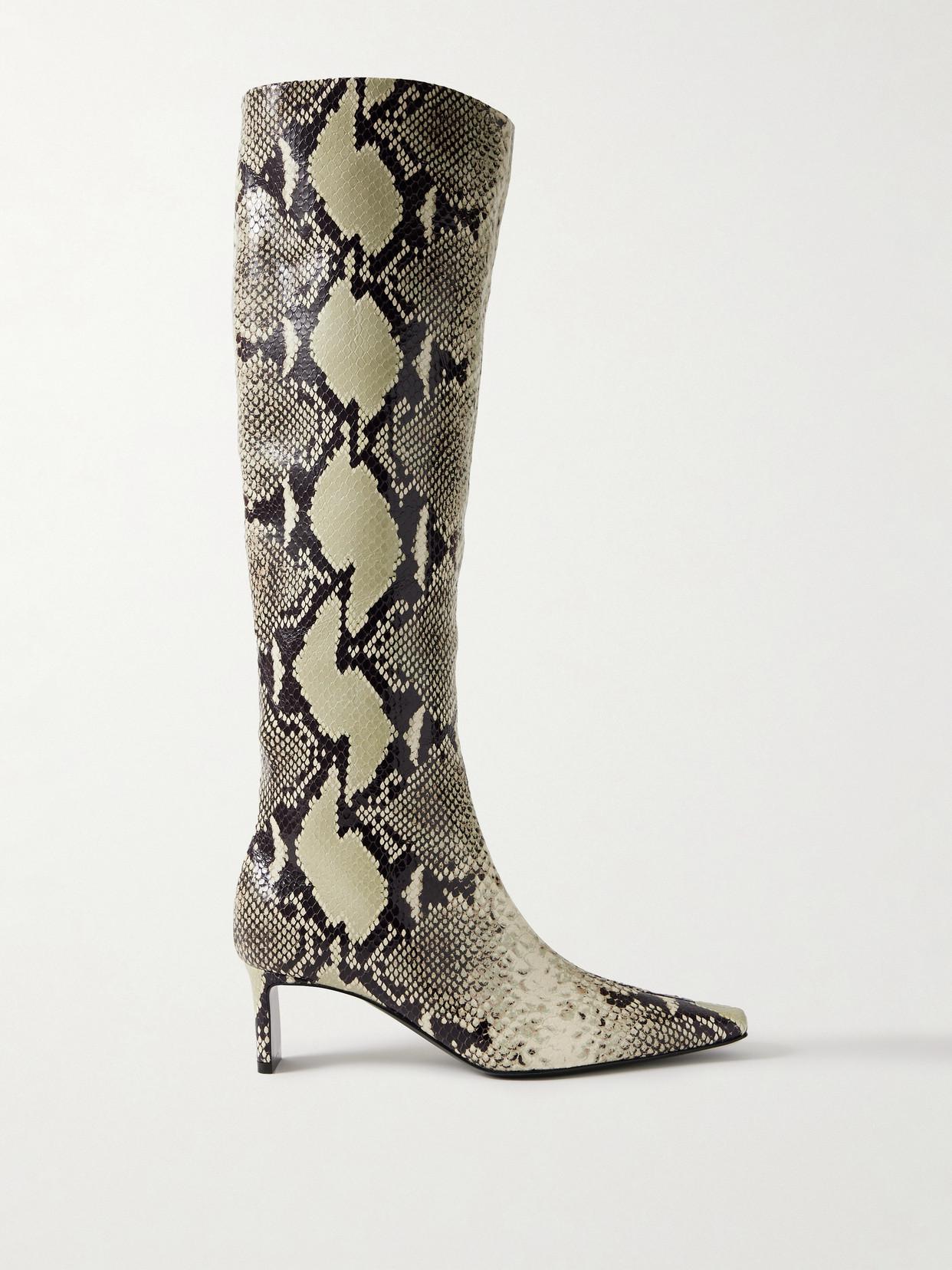 KHAITE Ona Snake-Print Leather Knee Boots in Animal print | endource
