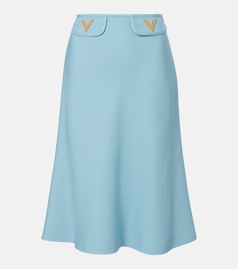 Light blue, A-line skirt with gold embroidered V details.