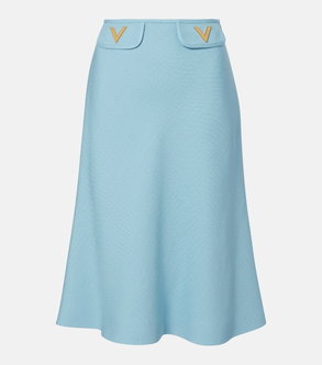 Light blue, A-line skirt with gold embroidered V details.