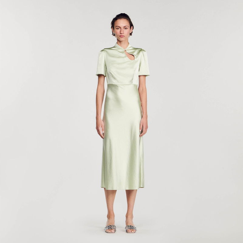 Pale green satin midi dress with a keyhole back.