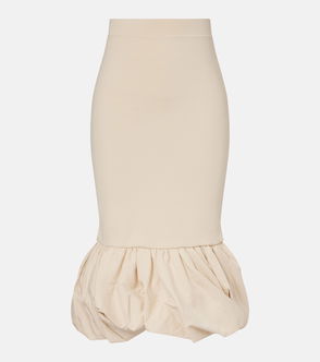 Cream-colored, pleated midi skirt with voluminous, puffed detailing at the hem.