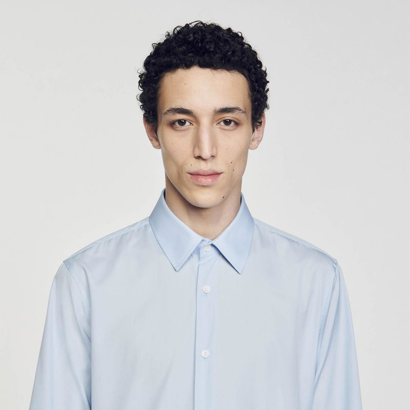 Sandro - Young man in light blue shirt