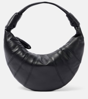 Black leather crescent-shaped hobo bag