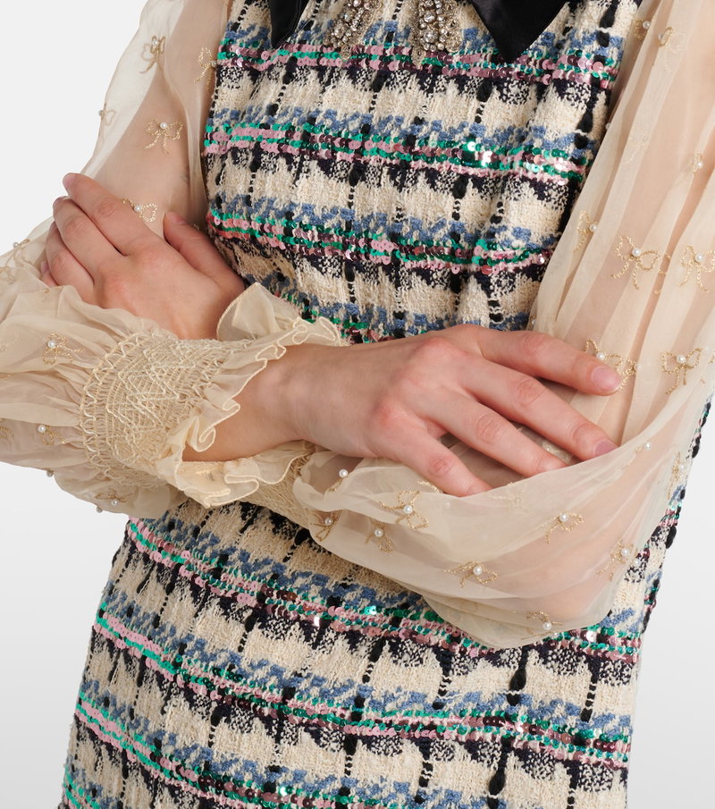 Valentino embellished tweed dress with sheer sleeves and beaded detailing.