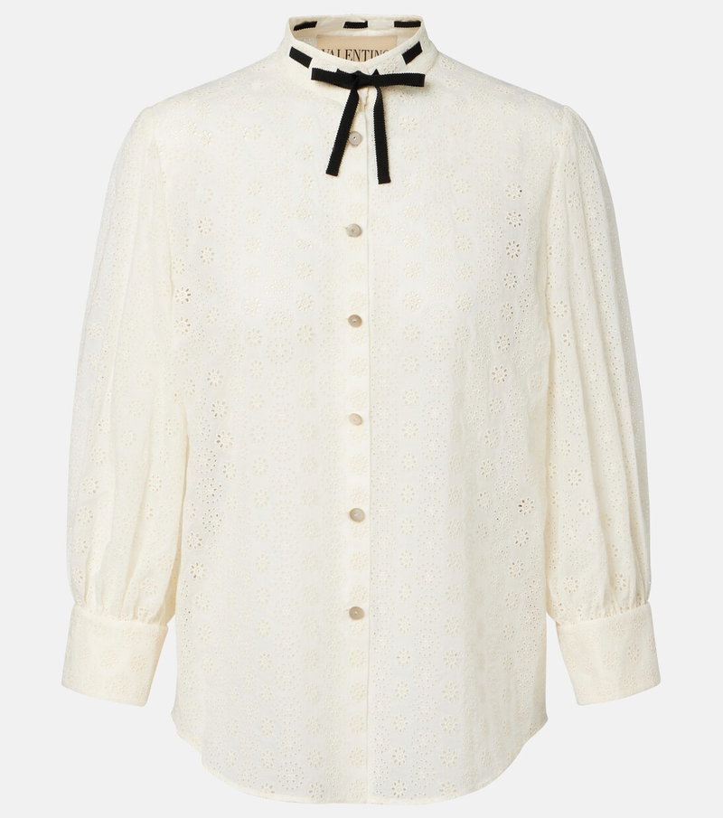 Off-white eyelet blouse with black ribbon tie