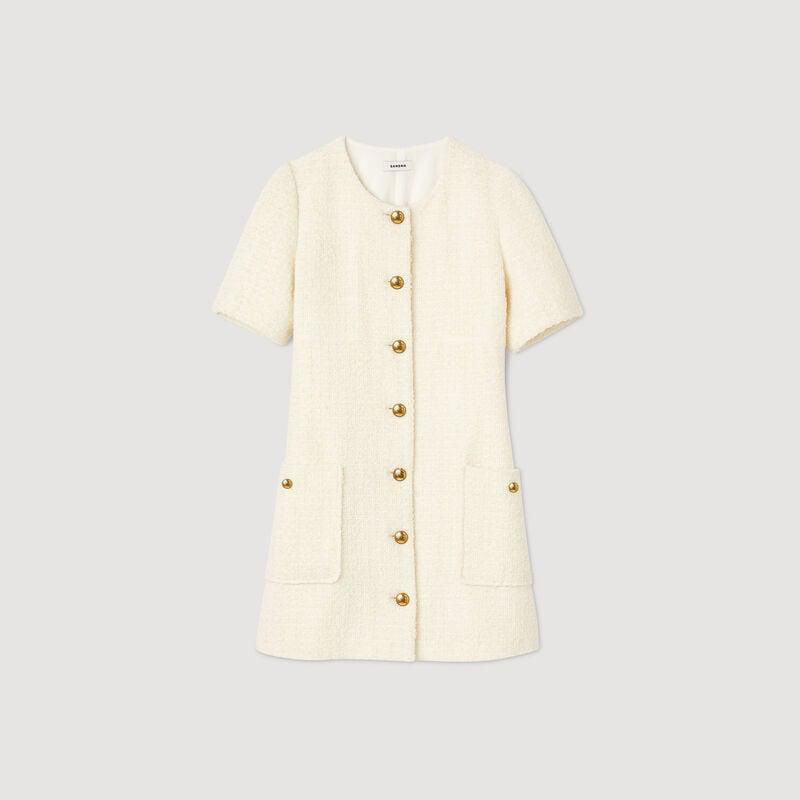 Cream-colored tweed dress with gold buttons
