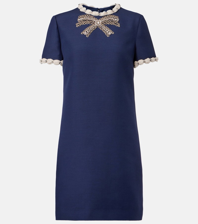 Navy blue dress with a pearl and rhinestone bow neckline