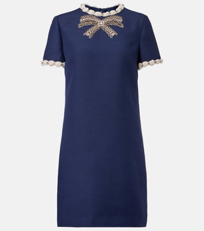 Navy blue dress with a pearl and rhinestone bow neckline