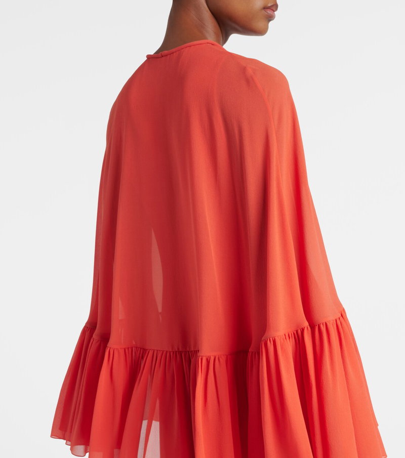 Valentino orange sheer cape with ruffled hemline