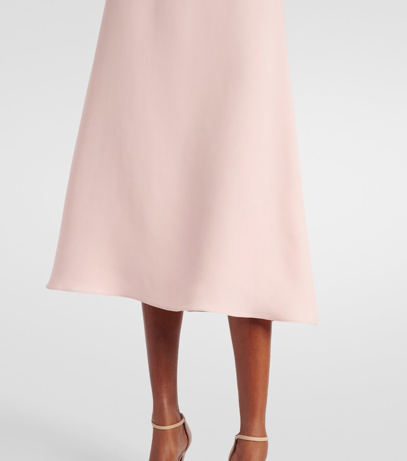 Pink satin midi skirt with flared hem.