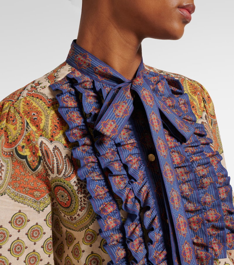 Valentino paisley blouse with ruffled collar.