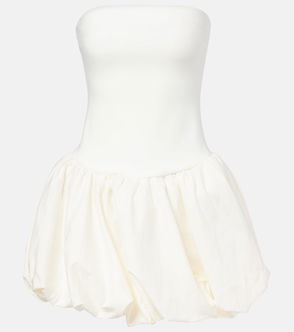 White balloon-skirted dress on a mannequin