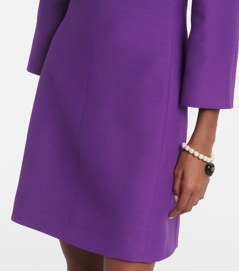 Purple velvet dress with pearl bracelet