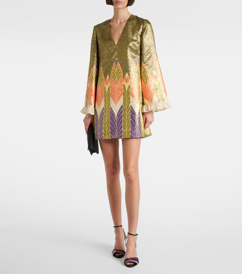 Valentino emerald green velvet mini dress with patterned sleeves and a matching clutch.