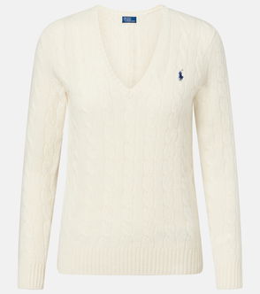 Cream-colored cable-knit sweater with a crew neck and Polo Ralph Lauren logo.