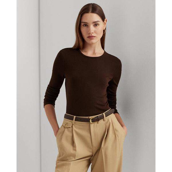 Brown long-sleeve crewneck top with a woman wearing pants and a belt.