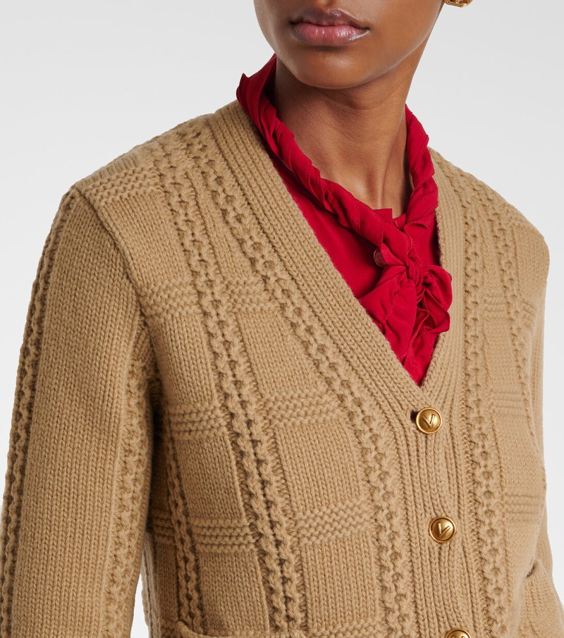 Camel cable-knit cardigan with red silk scarf