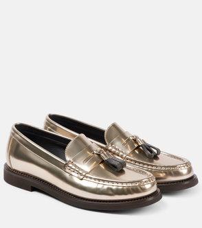 Gold leather loafers with silver tassels.