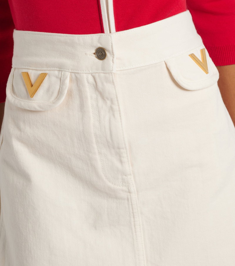 White denim skirt with yellow Valentino logo pockets