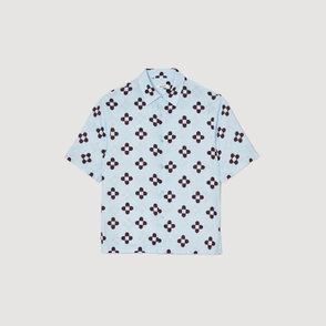 Light blue silk shirt with a dark floral print.