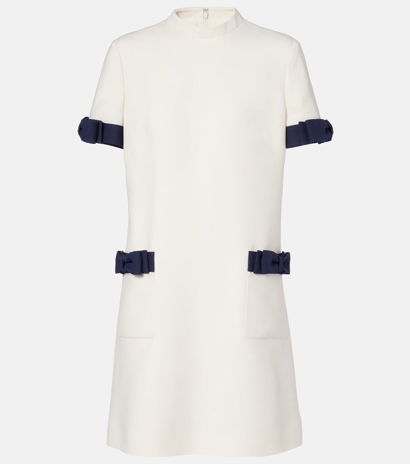 White dress with navy ribbon detailing