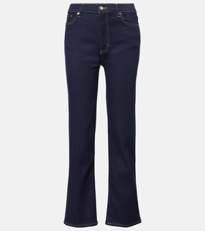 Dark wash denim jeans with gold stitching and hardware