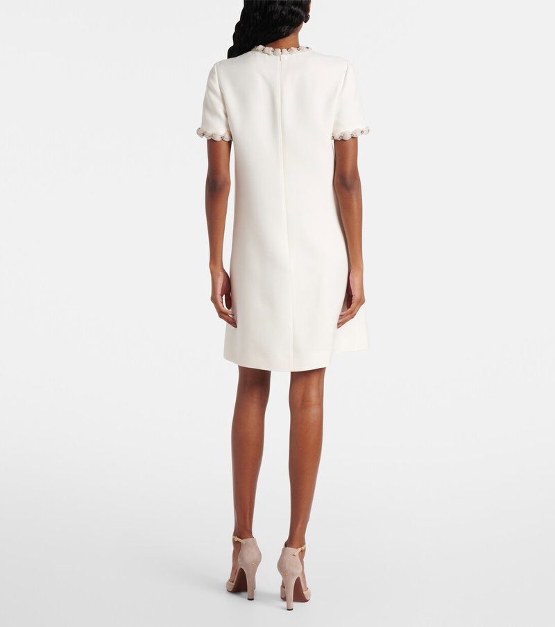 Cream-colored dress with pearl embellishments