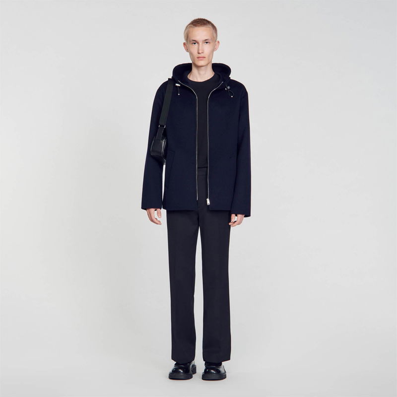 Sandro black wool coat with attached crossbody bag.