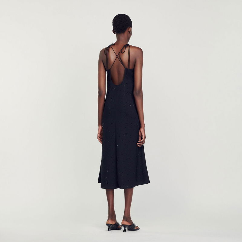 Black satin midi dress with crisscross straps