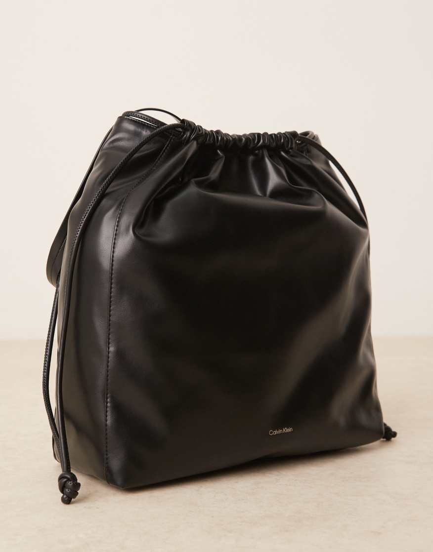 CALVIN KLEIN Drawstring Leather Tote Bag In Black | endource