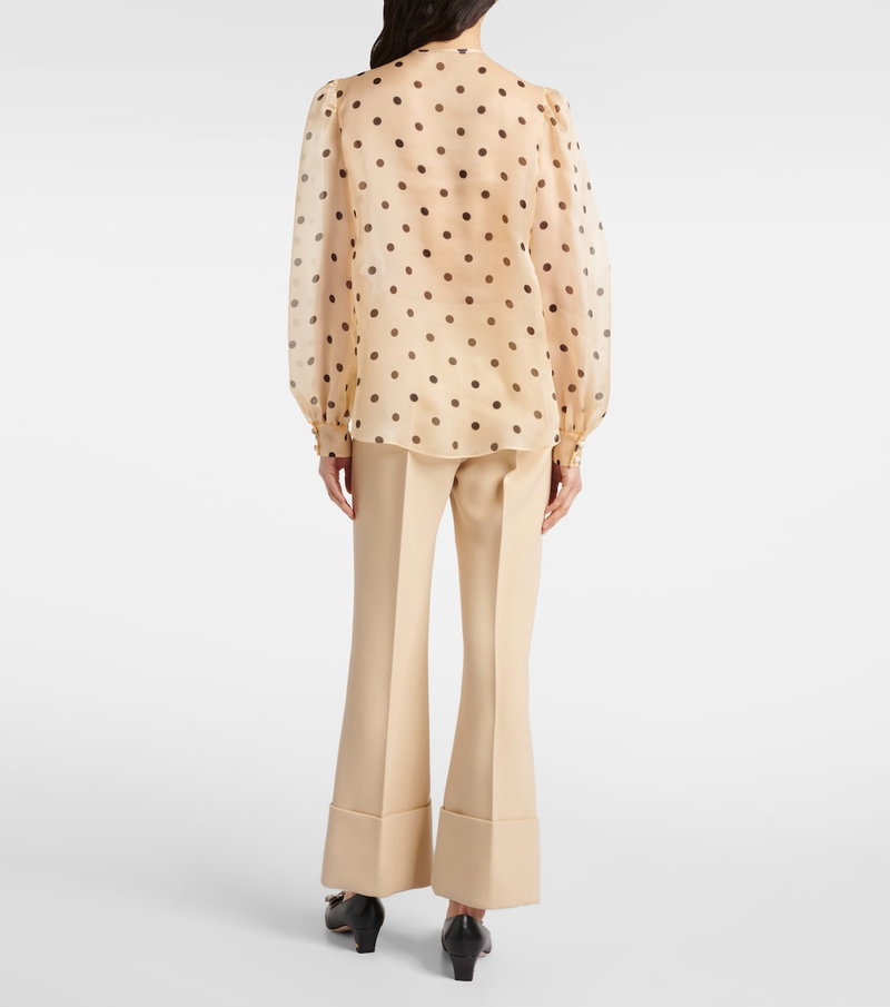 Valentino backless blouse with polka dots and flared trousers