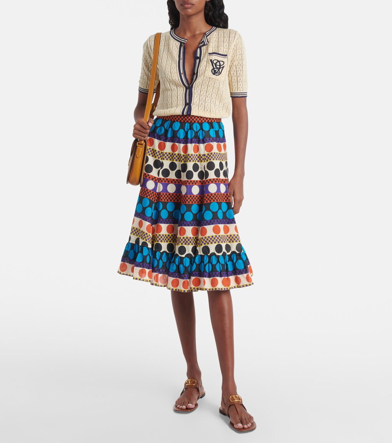 Valentino model wearing a patterned skirt and cardigan