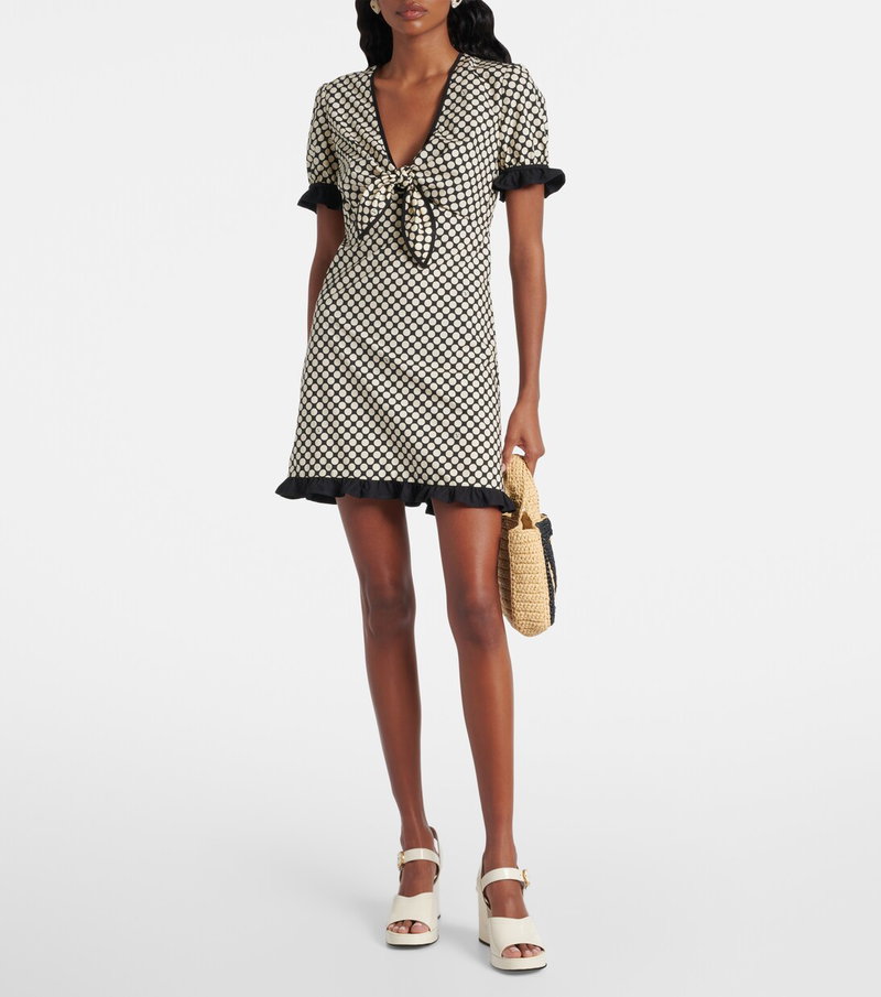 Valentino printed mini dress with tie neck and straw bag