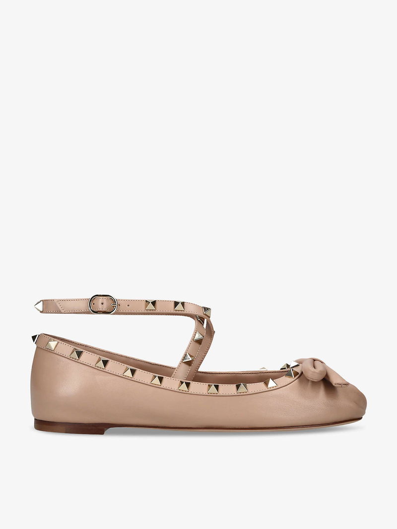 VALENTINO GARAVANI Rockstud Bow-Embellished Crossover-Strap Leather ... image.